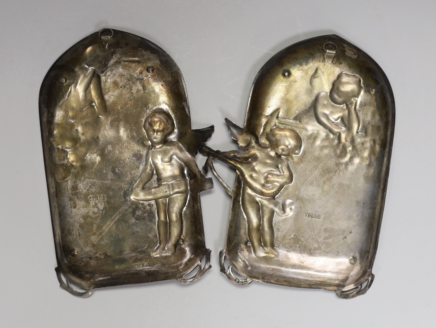 A pair of WMF style plaques, 22cm long